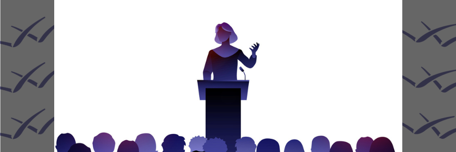 woman speaking to audience