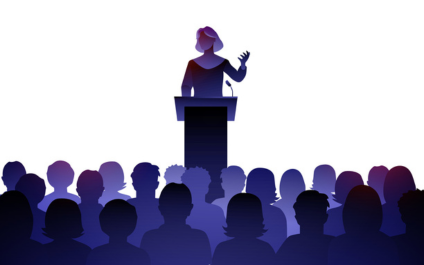 woman speaking to audience